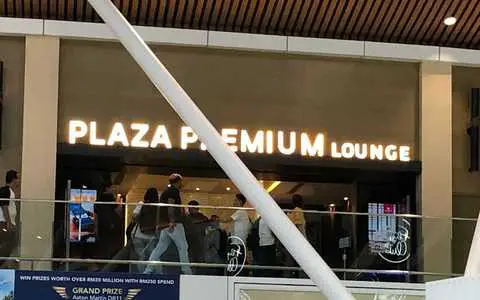 Took a photo of a Plaza Premium lounge entrance. Access passes can be purchased on the Plaza Premium website. I'll try to get a clearer one next time.
